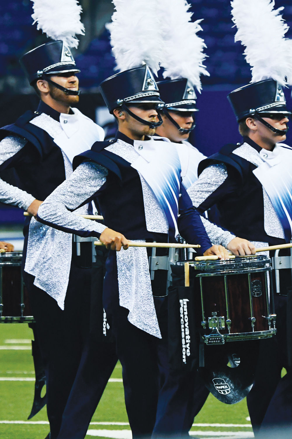 Drum and bugle corps march into Farmington 3
